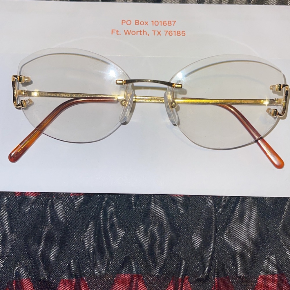 Cartier Glasses with transitional lenses comes with 2 sets of lenses
